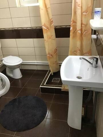Фото номера Трехместный номер с собственной ванной комнатой вне номера Гостевой дом Casa Titi г. Эфорие-Норд 2