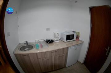 Фото номера Апартаменты с 2 спальнями Гостевой дом Casa Sagrada г. Эфорие-Норд 10