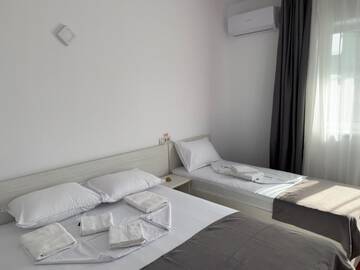 Фото номера Трехместный номер Гостевой дом Casa Margo г. Эфорие-Норд 5