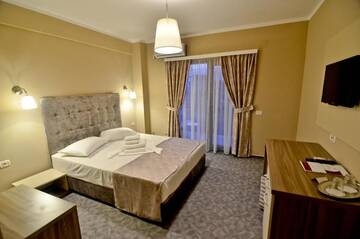 Фото номера Двухместный номер с 1 кроватью и балконом Отель Lucas Boutique Hotel г. Эфорие-Норд 9