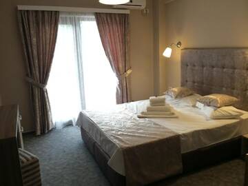 Фото номера Двухместный номер с 1 кроватью и балконом Отель Lucas Boutique Hotel г. Эфорие-Норд 12