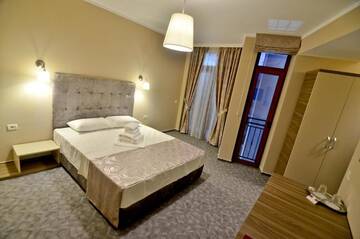 Фото номера Двухместный номер с 1 кроватью и балконом Отель Lucas Boutique Hotel г. Эфорие-Норд 14