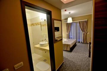 Фото номера Двухместный номер с 1 кроватью и балконом Отель Lucas Boutique Hotel г. Эфорие-Норд 19