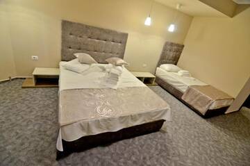 Фото номера Трехместный номер с балконом Отель Lucas Boutique Hotel г. Эфорие-Норд 4