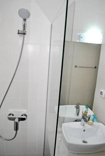 Фото номера Двухместный номер с 1 кроватью Гостевой дом Vila Ryanna Beach г. Эфорие-Норд 22