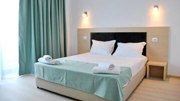 Фото номера Двухместный номер с 1 кроватью Гостевой дом Vila Ryanna Beach г. Эфорие-Норд 20