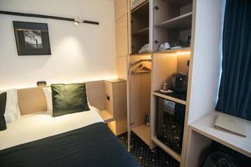 Фото номера Небольшой двухместный номер с 1 кроватью - Мезонин Отель Aqvatonic Hotel - Steaua de Mare г. Эфорие-Норд 4