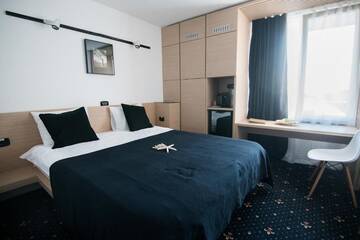 Фото номера Небольшой двухместный номер с 1 кроватью - Мезонин Отель Aqvatonic Hotel - Steaua de Mare г. Эфорие-Норд 5