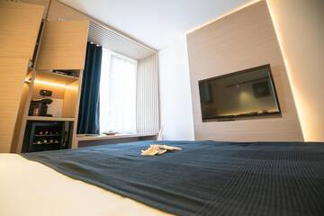 Фото номера Небольшой двухместный номер с 1 кроватью - Мезонин Отель Aqvatonic Hotel - Steaua de Mare г. Эфорие-Норд 3